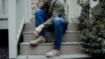 Best Jeans for Men Model Wearing Mugsy Jeans and Boots