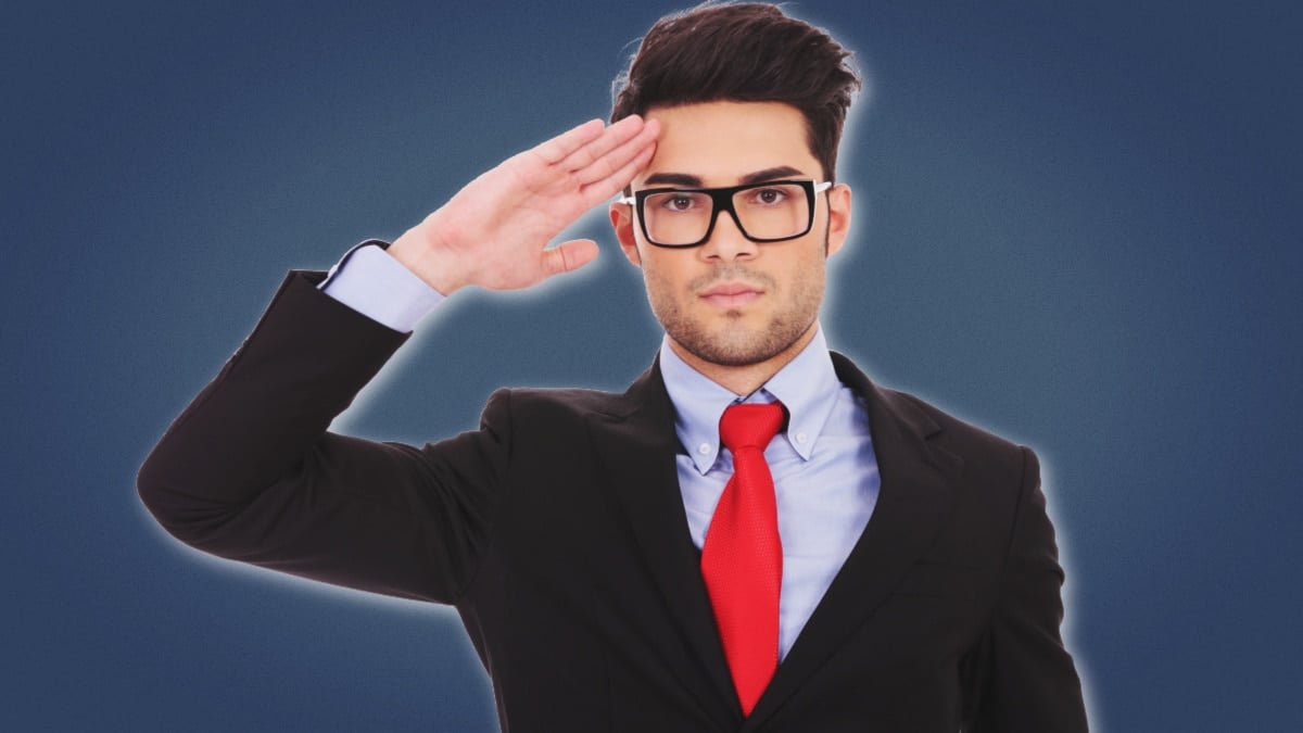 Beta Male Attractive Business Man in Suit With Red Tie Saluting