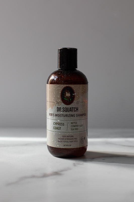 Dr. Squatch Cedar Cypress shampoo with water detail