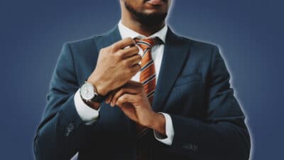 2021/02/How-to-Command-Respect_-African-American-Man-in-Fitted-Suit-Adjusting-Watch-Strap.jpg