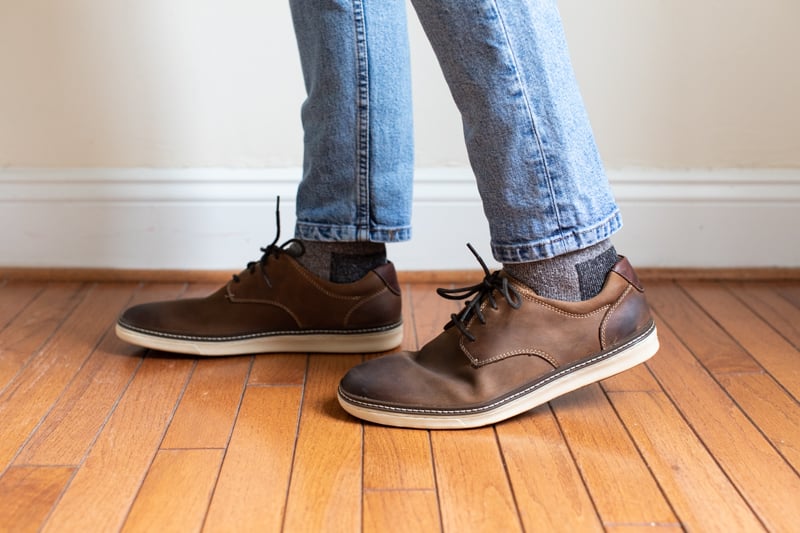 Johnston and Murphy McGuffey Plain Toe from side being worn with blue jeans