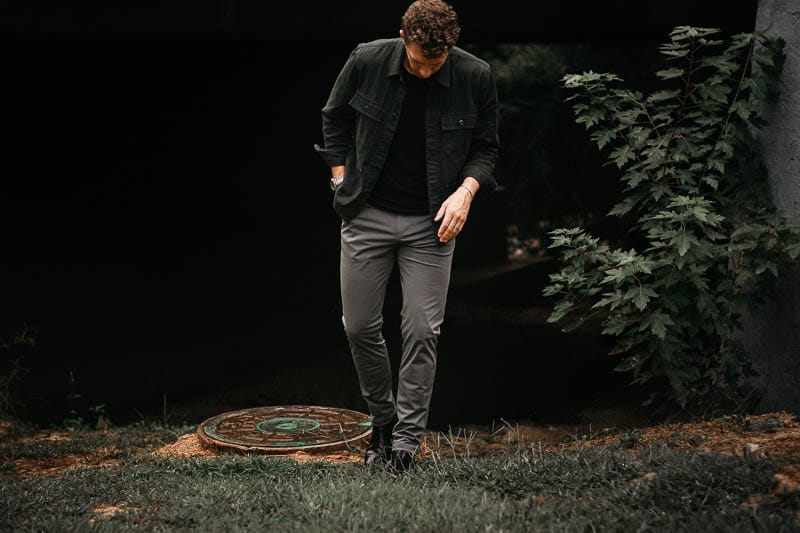 model in rhone commuter pants grey slim