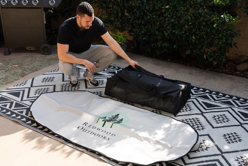 Model unpacks Redwood Outdoors Yukon Cold Plunge bag