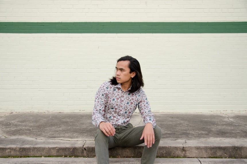 Model Wearing Apposta 100% Pure Cotton Poplin Floral And Sitting On Street Landscape