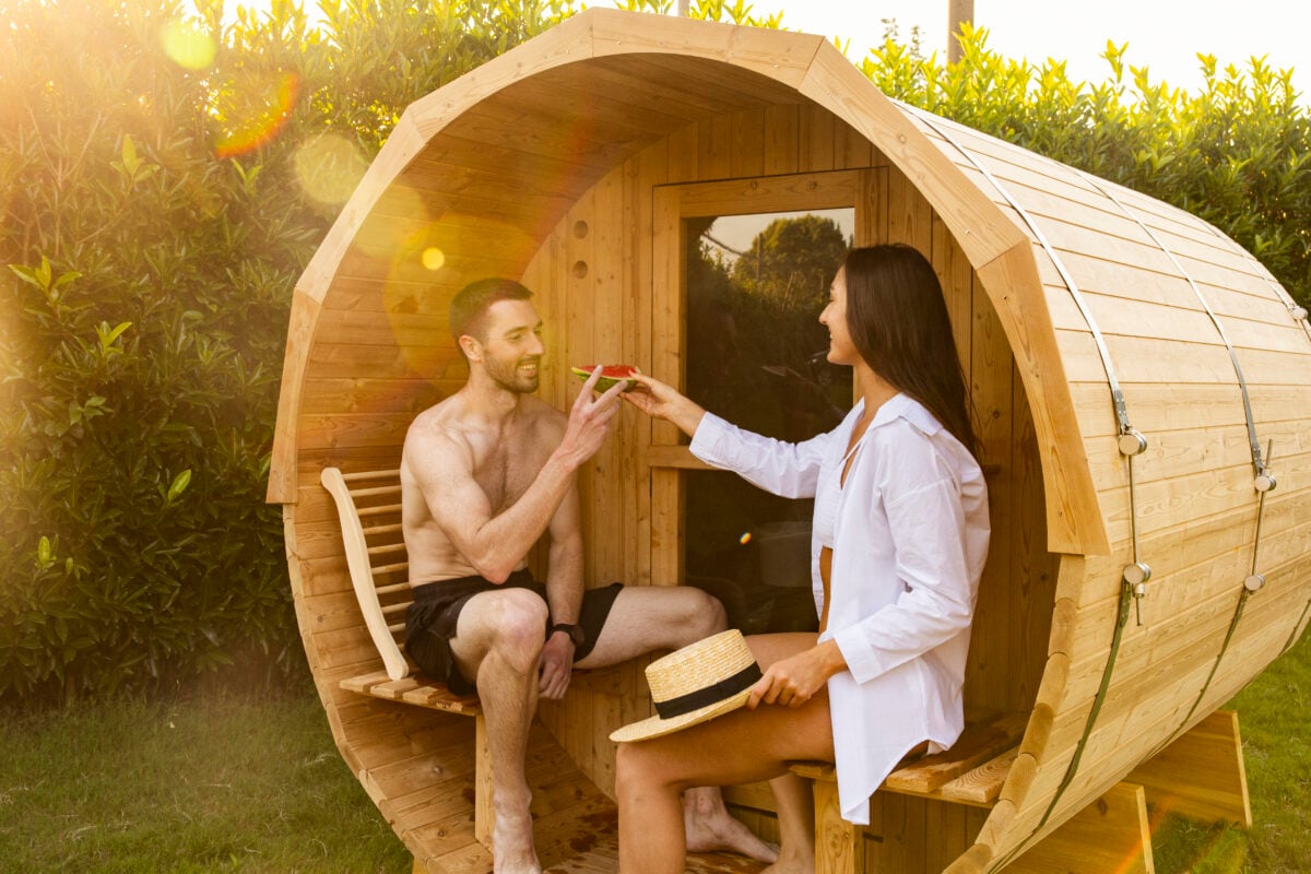 Models use Redwood Outdoors sauna