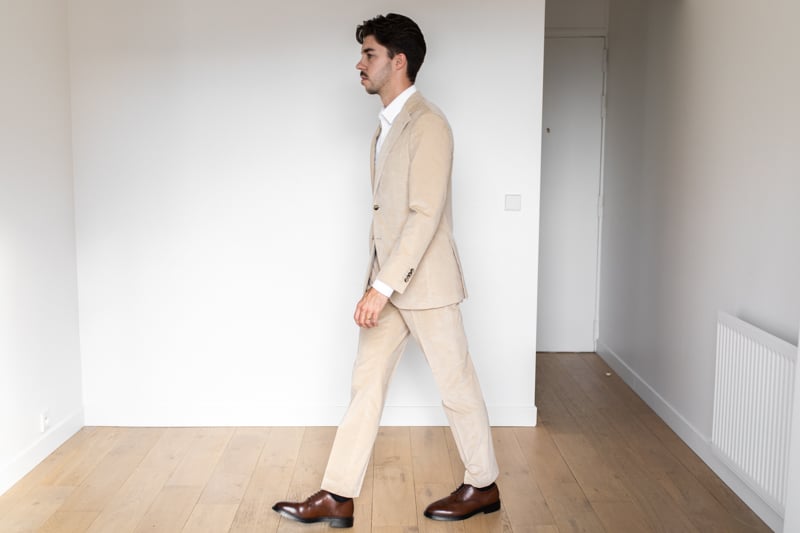 Suitsupply Custom Suit model walking from side